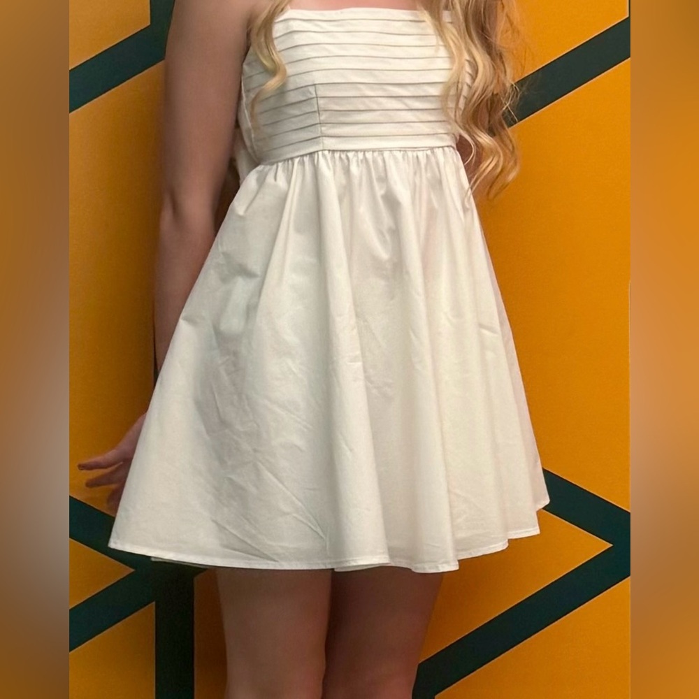 White mini dress with bow